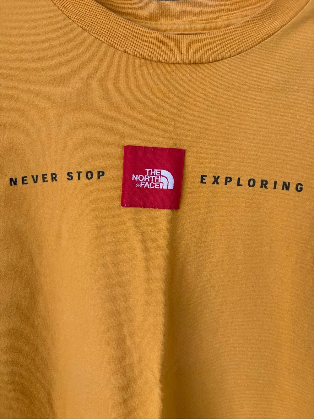 The North Face Men's Yellow 'Never Stop Exploring' Logo Tee